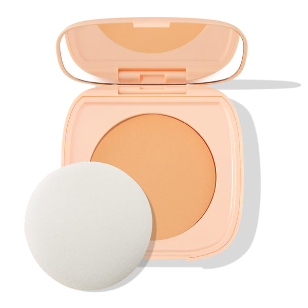 ColourPop Pretty Fresh Face Powder in Light 8 shown open, revealing the pressed powder pan and built-in mirror, with a round white sponge applicator beside the peach compact on a white background.