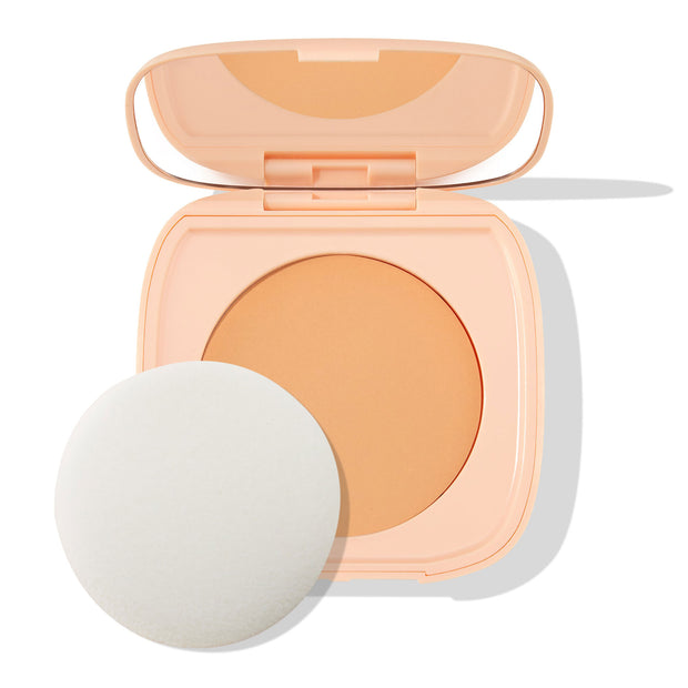 ColourPop Pretty Fresh Face Powder in Light 8 shown open, revealing the pressed powder pan and built-in mirror, with a round white sponge applicator beside the peach compact on a white background.