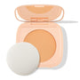 ColourPop Pretty Fresh Face Powder in Light 8 shown open, revealing the pressed powder pan and built-in mirror, with a round white sponge applicator beside the peach compact on a white background.