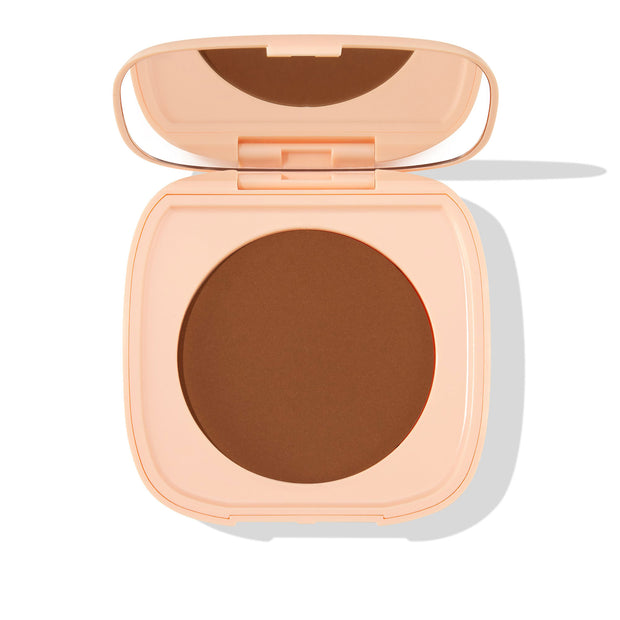 Peach square compact opens to reveal Deep Dark 21, a deep brown pressed pan of ColourPop Pretty Fresh Face Powder, with built-in mirror, shown against a white background.