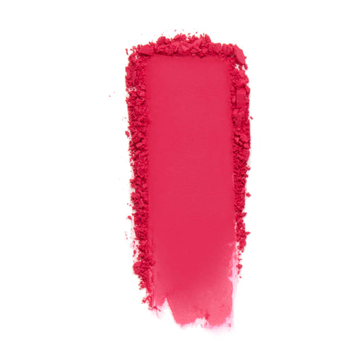 ColourPop Pressed Powder Blush Text Me swatch shows a vivid hot-pink matte pigment dragged in a rectangular swipe with crumbled edges, set against a white background.