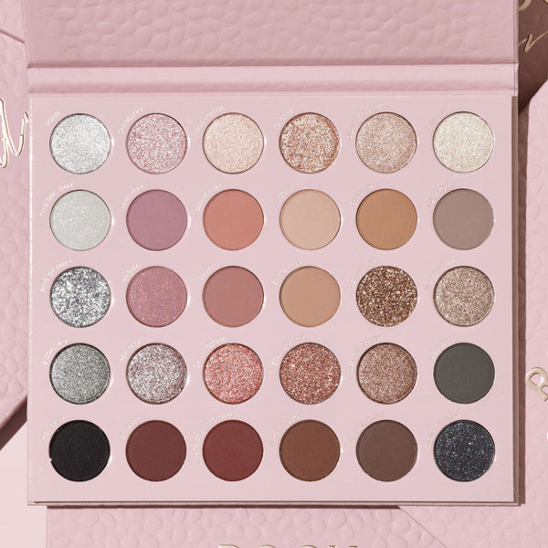 Rock Candy ColourPop Shadow Palette sits open, showing 30 round pans arranged in a 5x6 grid of neutral-to-rosy mattes and sparkling metallics - silvers, champagnes, pinks, taupes, tans, bronzes, charcoal, and black - in a blush pink textured case.