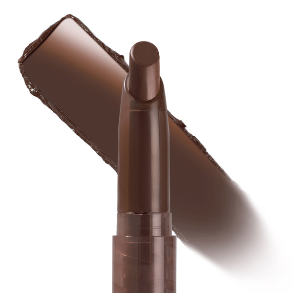 Oh, Behave ColourPop Lippie Stix lays down a creamy deep cocoa-brown swatch, with the slim twist-up bullet pictured beside the swipe on a white background.