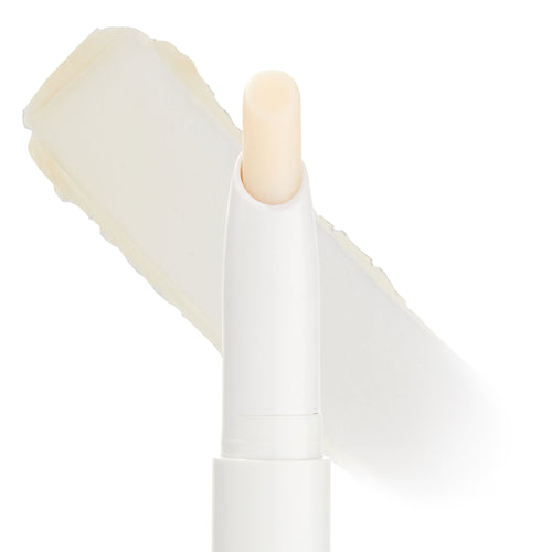 ColourPop Lippie Stix Primer shown uncapped, revealing a creamy translucent lip primer in a slim white twist-up tube, with an off-white product swatch behind on a clean white background.