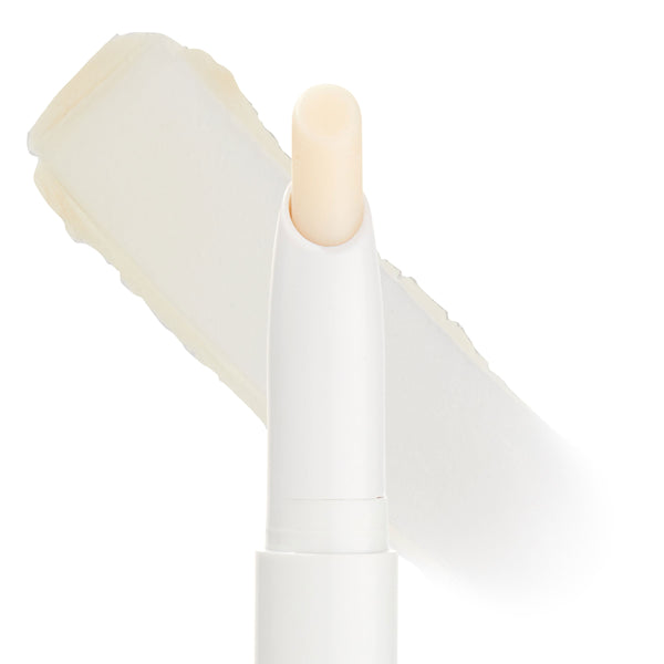 ColourPop Lippie Stix Primer shown uncapped, revealing a creamy translucent lip primer in a slim white twist-up tube, with an off-white product swatch behind on a clean white background.