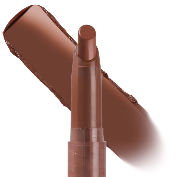ColourPop Lippie Stix in Sassy displays its uncapped twist-up, angled bullet while a thick swipe of the creamy warm chocolate-brown shade trails behind on a white background, showcasing the smooth satin lipstick crayon.