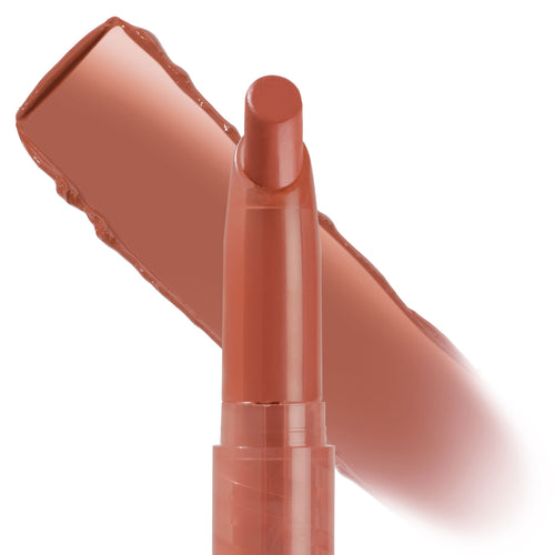At Twilight ColourPop Lippie Stix shown uncapped and upright, a warm terracotta nude bullet with a creamy satin finish, set against a bold swipe swatch on a white backdrop, highlighting the slim, precise twist-up design.
