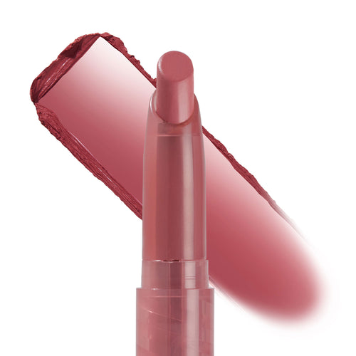 ColourPop Lippie Stix Cami in a slim twist-up tube swiping a dusty rose-mauve color across a white backdrop, with a creamy, opaque swatch behind the bullet to showcase the shade and texture.
