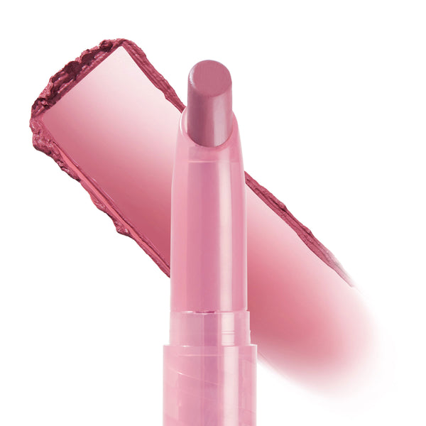 ColourPop Lippie Stix in Westie, uncapped bullet angled forward with a creamy cool pink swipe behind, shown on a white backdrop, slim twist-up tube showcasing a satin finish.