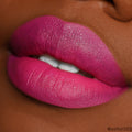 Fuchsia lips lined and filled with ColourPop Lippie Pencil Heart On, showcasing rich matte color, crisp edges, and full coverage in an extreme close-up on deep skin.