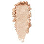 Flower Child ColourPop Super Shock Shadow swatch - shimmery champagne-peach eyeshadow smeared in a vertical strip, showing metallic payoff and creamy texture on a clean white background.