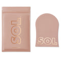 Tanning Mitt showcases a blush-pink, velvety SOL Body applicator lying flat beside its matching resealable pouch on a white background, gold logo visible, for streak-free self-tanner application from ColourPop Makeup Tools & Accessories.