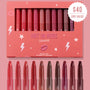 ColourPop Lippie Stix Hot in Here vault displaying a 10-piece set of lip crayons, gradiented from soft pinks to deep berries and browns, in a coral box with stars and lightning; uncapped shades lined below and $40 value badge on a pink backdrop.