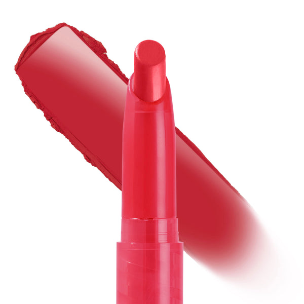 ColourPop Lippie Stix Hot in Here standing upright with a bold red swatch brushed diagonally behind, a slim twist-up lip crayon in vivid warm red housed in a matching tube on a white background, highlighting its creamy full-coverage finish.