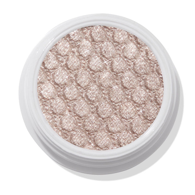 ColourPop I Heart This Super Shock Shadow displaying a sparkly champagne-beige eyeshadow with silver shimmer and a bouncy quilted texture, set in a round white pot and shown top-down on a clean white background.