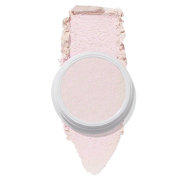 ColourPop Monster Super Shock Highlighter shown in an open white pot with a broad smear swatch behind it, revealing a silky pale pink, iridescent pearl glow, isolated on a clean white background.