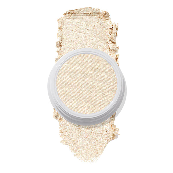 ColourPop Stole the Show Super Shock Highlighter in a round white pot sits atop a thick champagne‑pearl swatch on a white background, showing its luminous shimmer finish for face highlighting.