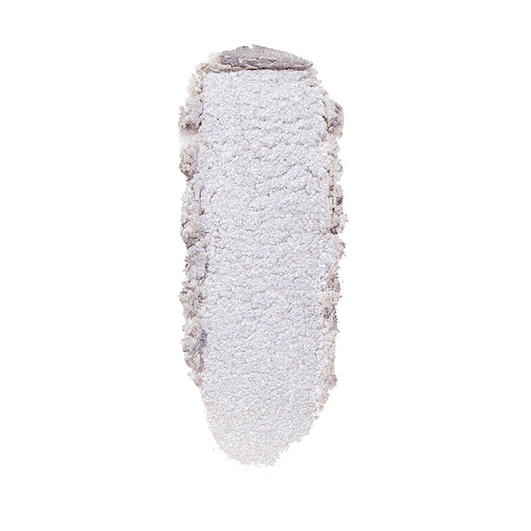 ColourPop Honeymoon Super Shock Highlighter swatch catching light as a long, oval smear of icy silver‑lavender shimmer with soft, crumbly edges, shown isolated on a clean white background.