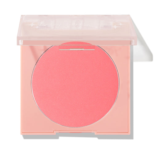 Big Reveal pressed powder blush showing a vibrant coral‑pink pan set in a pale peach square compact with a clear lid slightly open on a white background; ColourPop Pressed Powder Blush for cheeks.