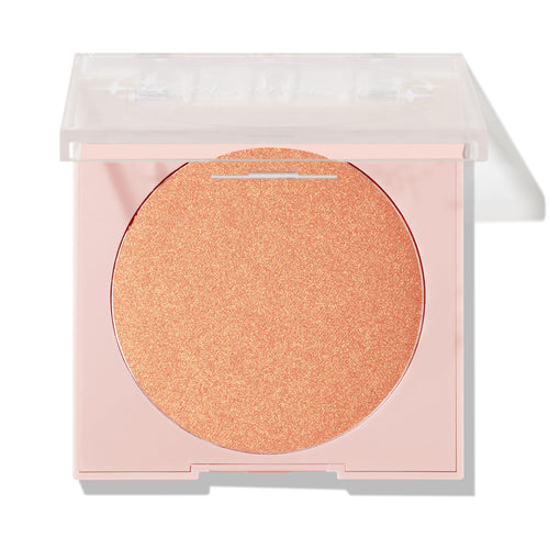 Boombox ColourPop Pressed Powder Highlighter displays a warm peach-gold shimmer pan in a pale pink compact with a half-open clear lid on a white background.