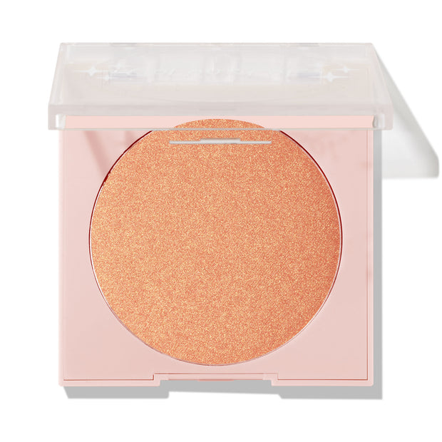 Boombox ColourPop Pressed Powder Highlighter displays a warm peach-gold shimmer pan in a pale pink compact with a half-open clear lid on a white background.