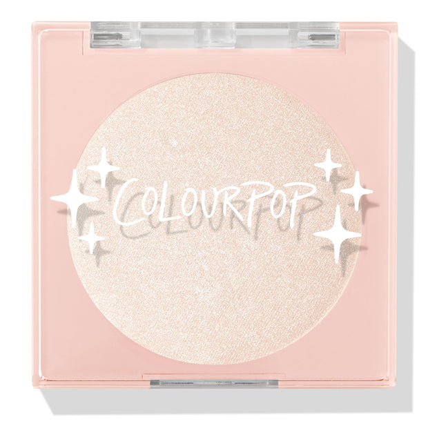 Cold One highlighter compact showcasing a shimmering icy pearl pan behind a clear lid with white sparkle icons and ColourPop logo, closed in a blush‑pink square case on a white background; ColourPop Pressed Powder Highlighter.