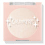 Cold One highlighter compact showcasing a shimmering icy pearl pan behind a clear lid with white sparkle icons and ColourPop logo, closed in a blush‑pink square case on a white background; ColourPop Pressed Powder Highlighter.
