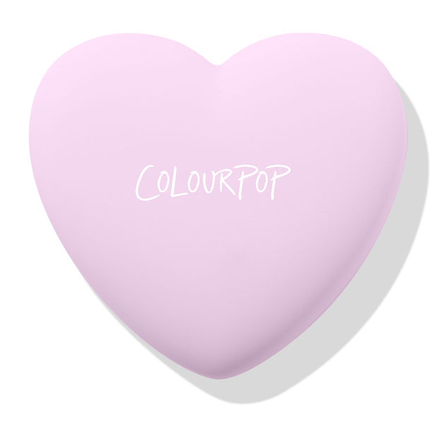 Cupid’s Bow ColourPop Pressed Powder Blush compact closed - pastel lavender heart-shaped case with white COLOURPOP logo, angled on a clean white background with a soft shadow.