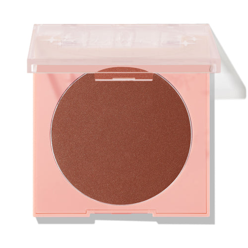 Full Throttle pressed powder blush sits in a pastel pink compact with a clear half-closed lid, revealing a warm copper-brown pan with a soft satin finish on a white background - ColourPop Pressed Powder Blush.