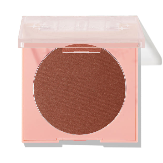 Full Throttle pressed powder blush sits in a pastel pink compact with a clear half-closed lid, revealing a warm copper-brown pan with a soft satin finish on a white background - ColourPop Pressed Powder Blush.