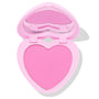 Hot 2 Touch ColourPop Pressed Powder Blush opens to reveal a heart-shaped pan of bright cool-toned pink pressed powder in a pastel pink heart compact with built-in mirror, shown half-open on a white background.