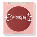 Icing on Top pressed powder blush compact closed, featuring a deep berry pan behind a clear lid with white ColourPop logo and star accents, housed in a pale pink square case on a white background; ColourPop Pressed Powder Blush.
