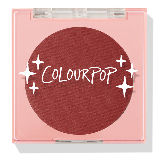 Icing on Top pressed powder blush compact closed, featuring a deep berry pan behind a clear lid with white ColourPop logo and star accents, housed in a pale pink square case on a white background; ColourPop Pressed Powder Blush.