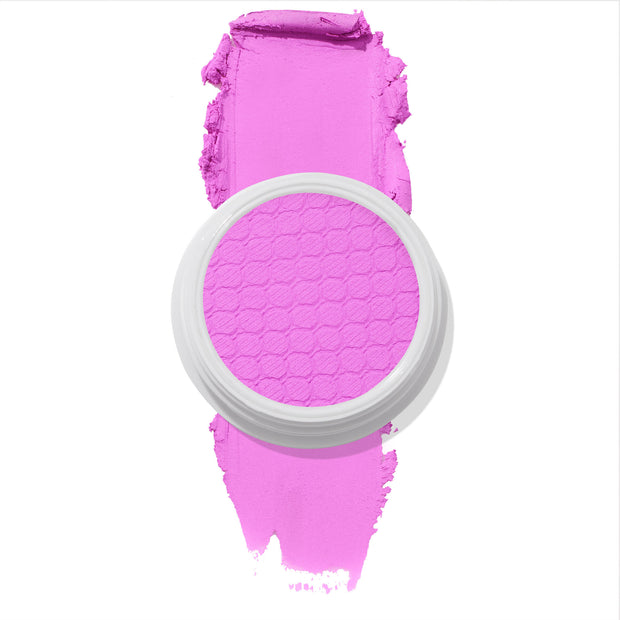 Lil Vibe Super Shock Blush by Colourpop, a vivid matte hot-pink cream blush in a white round pot with a textured surface, shown swiped across a white background for Shop All Colourpop makeup shoppers.