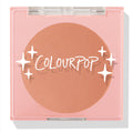 No Rules ColourPop Pressed Powder Blush displays a warm peach pan in a pink square compact with a clear lid, white ColourPop logo, and star sparkles, shown closed against a white background.