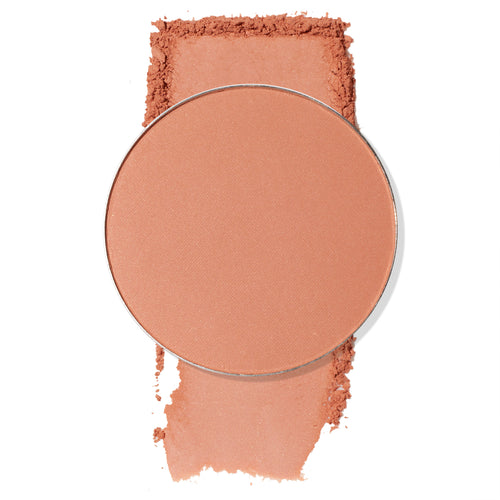 Round No Rules pan showcasing ColourPop Pressed Powder Blush Single, a soft matte warm peach, with crushed powder and a swatch above and below the pan on a white background.