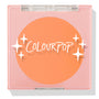 Roxbury Dr ColourPop Pressed Powder Blush compact showing a bright tangerine shade, closed in a pink square case with a clear lid and white star graphics.