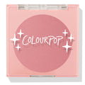 Sassy Pants ColourPop Pressed Powder Blush compact showcasing a rosy matte pan, closed with a clear lid and white star accents over the logo, set in a square light-pink plastic case on a clean white background.