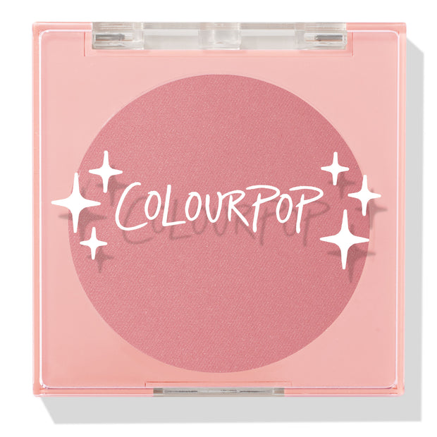 Sassy Pants ColourPop Pressed Powder Blush compact showcasing a rosy matte pan, closed with a clear lid and white star accents over the logo, set in a square light-pink plastic case on a clean white background.