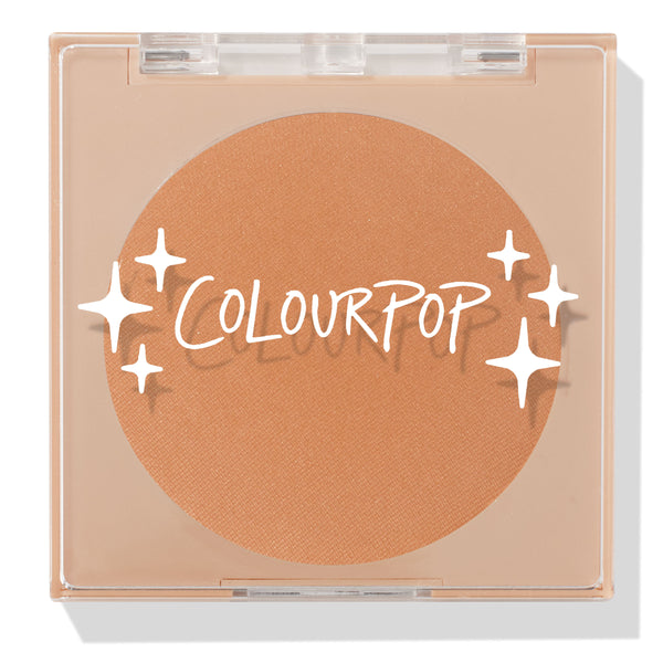 ColourPop Pressed Powder Bronzer in Silver Strand Beach, a warm tan matte shade, shown closed in a square clear compact with white ColourPop logo and star accents on the lid, displaying the full round pan in a sleek beige case.