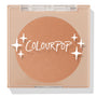 ColourPop Pressed Powder Bronzer in Talk to the Palm, a warm matte tan shade, sits in a clear-lidded square nude compact with white ColourPop logo and star accents, shown closed to display the full round pan.