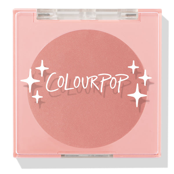 ColourPop Pressed Powder Blush, To the 10, closed compact showcasing a warm rosy matte pan inside a translucent pink square case with clear lid and white star logo, studio-lit on a clean light background.