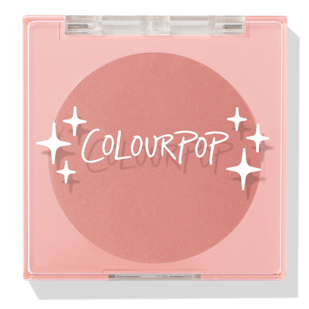 ColourPop Pressed Powder Blush, To the 10, closed compact showcasing a warm rosy matte pan inside a translucent pink square case with clear lid and white star logo, studio-lit on a clean light background.