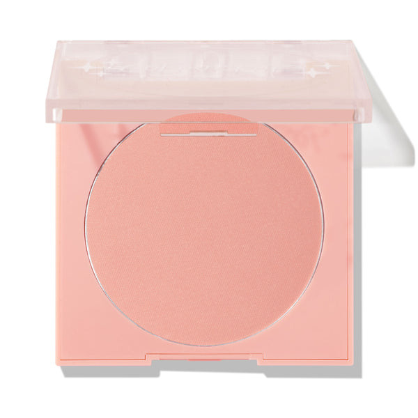 Why Hello ColourPop Pressed Powder Blush showing a peachy‑pink matte pan in a soft pink square compact with a clear lid half open on a white background.